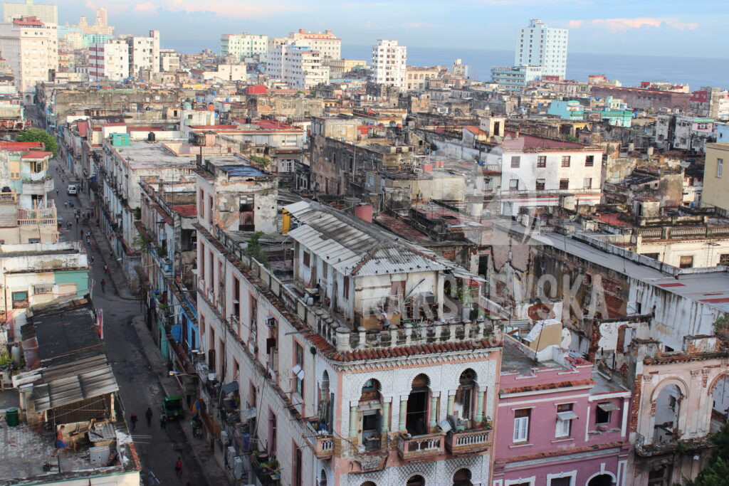 Overlooking rooftops and narrow streets filled with life